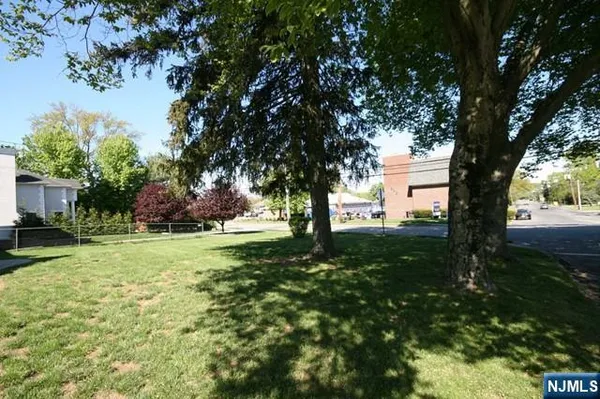 a view of backyard with green space
