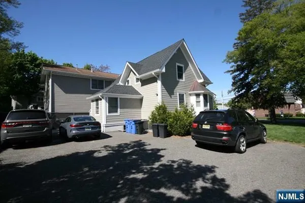 a car parked in front of a house
