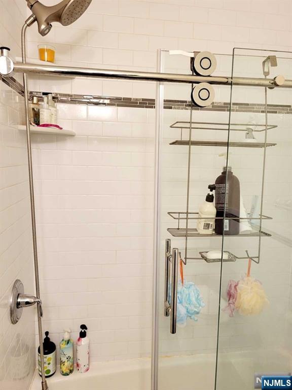 296 County Road, Unit 1 Tenafly, NJ 07670 - Photo 10 of 16 a bathroom with a shower