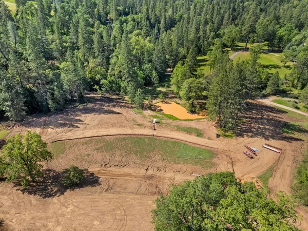 a view of a backyard of a house
