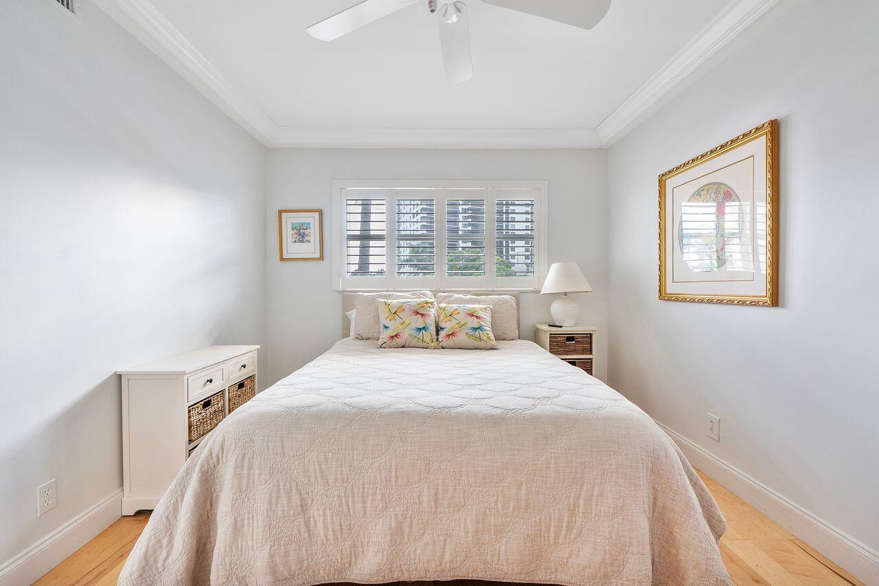 3310 South Ocean Boulevard, Unit 231D Highland Beach, FL 33487 - Photo 19 of 31 a bedroom with a bed and a window