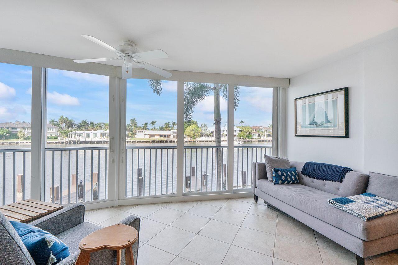 3310 South Ocean Boulevard, Unit 231D Highland Beach, FL 33487 - Photo 21 of 31 a living room with furniture and a large window