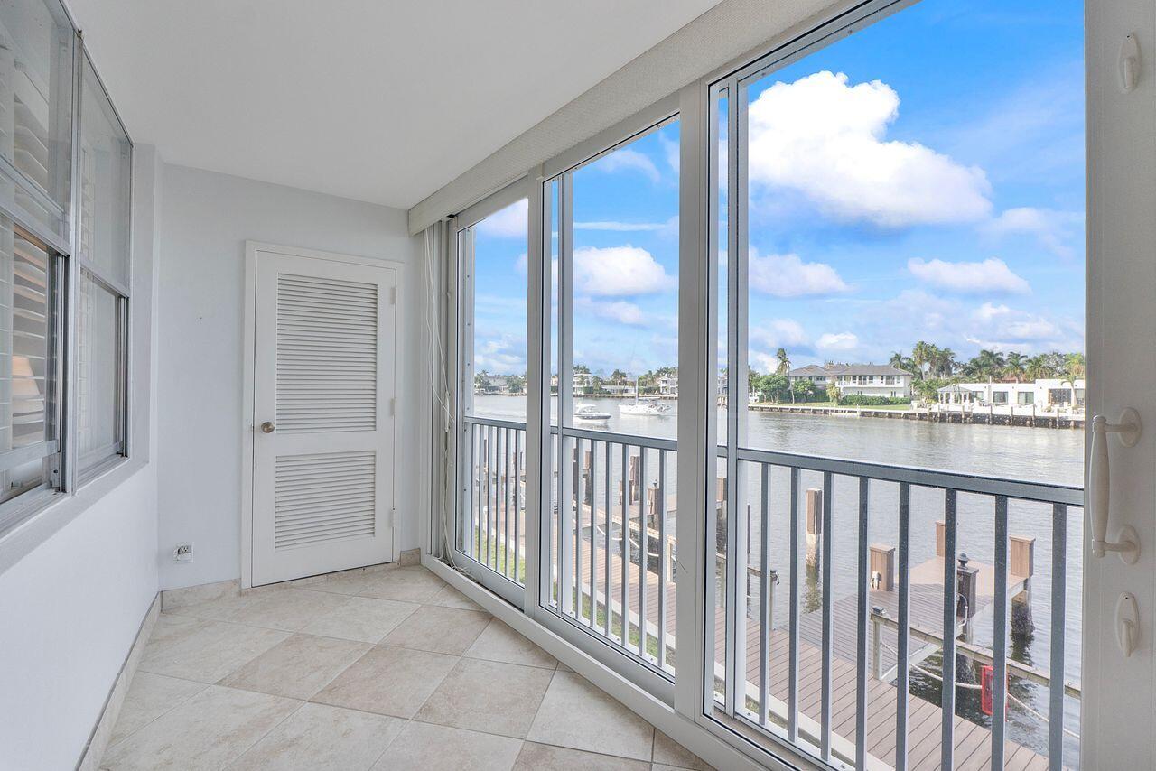 3310 South Ocean Boulevard, Unit 231D Highland Beach, FL 33487 - Photo 22 of 31 a view of a city from a balcony