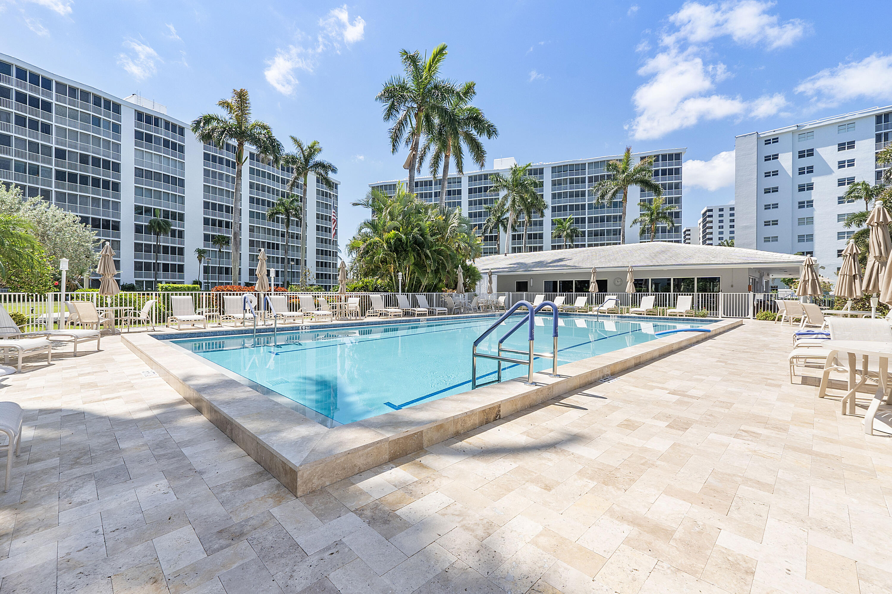 3310 South Ocean Boulevard, Unit 231D Highland Beach, FL 33487 - Photo 28 of 31 a view of building with outdoor space and swimming pool