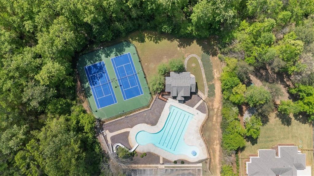 7610 Scenic Overlook Cumming, GA 30041 - Photo 53 of 62 an aerial view of a house with outdoor space and trees all around