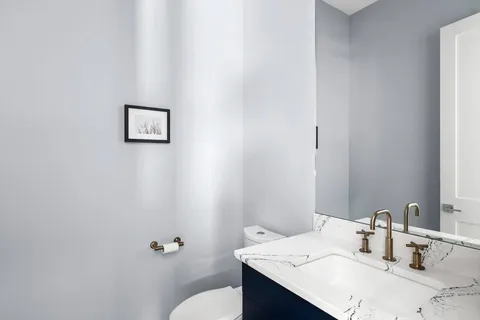 a bathroom with a sink and a toilet