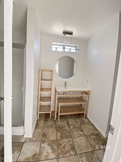 332 North Fairview Street Ridgecrest, CA 93555 - Photo 12 of 16 a view of a hallway to rooms and stairs