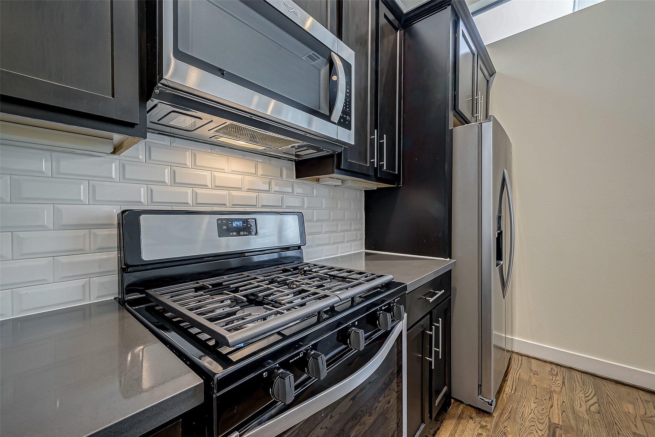 4025 Tulane Street Houston, TX 77018 - Photo 14 of 43 a stove top oven sitting inside of a kitchen