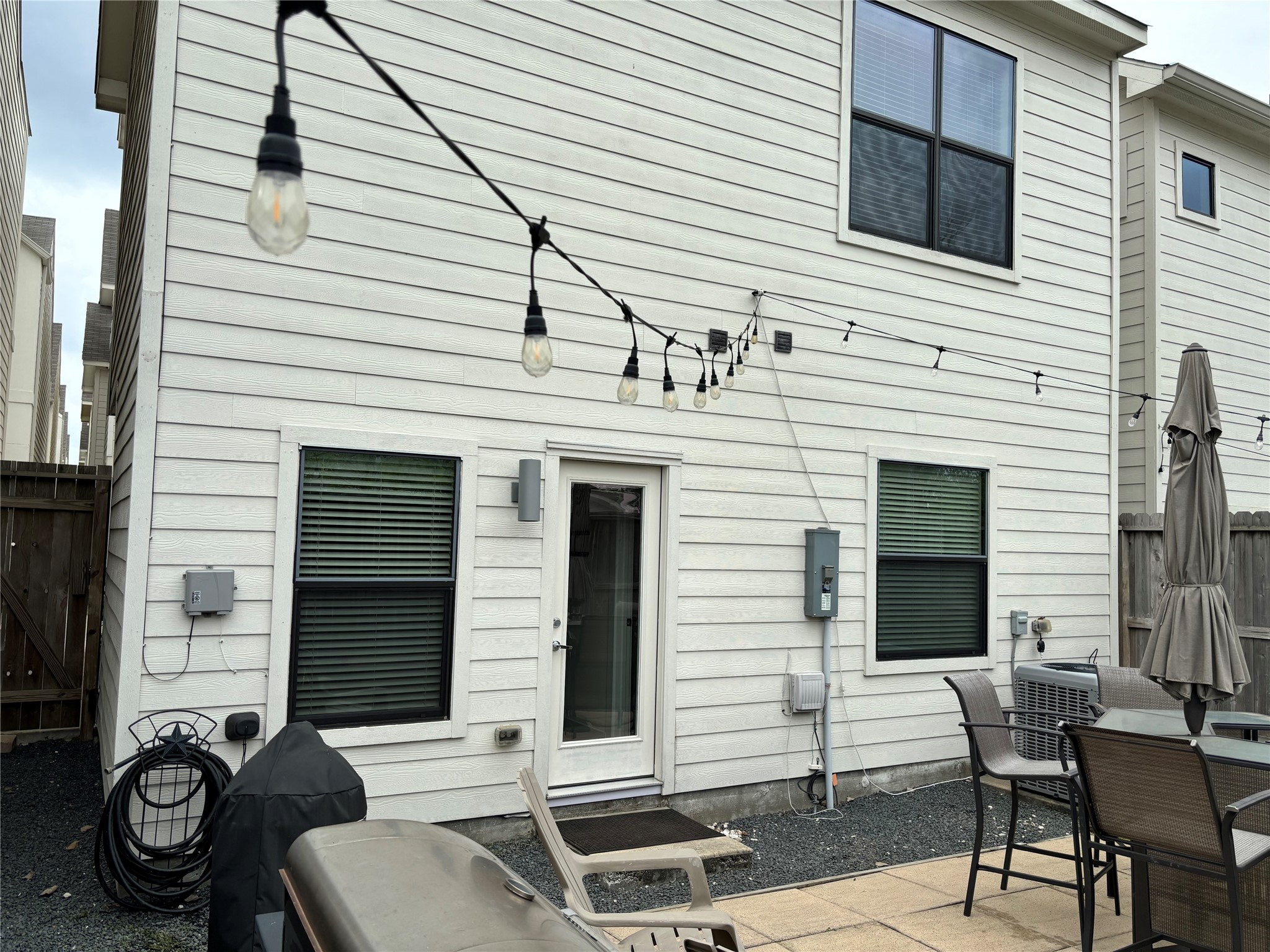 4025 Tulane Street Houston, TX 77018 - Photo 39 of 43 a view of a patio with couches chairs and potted plants