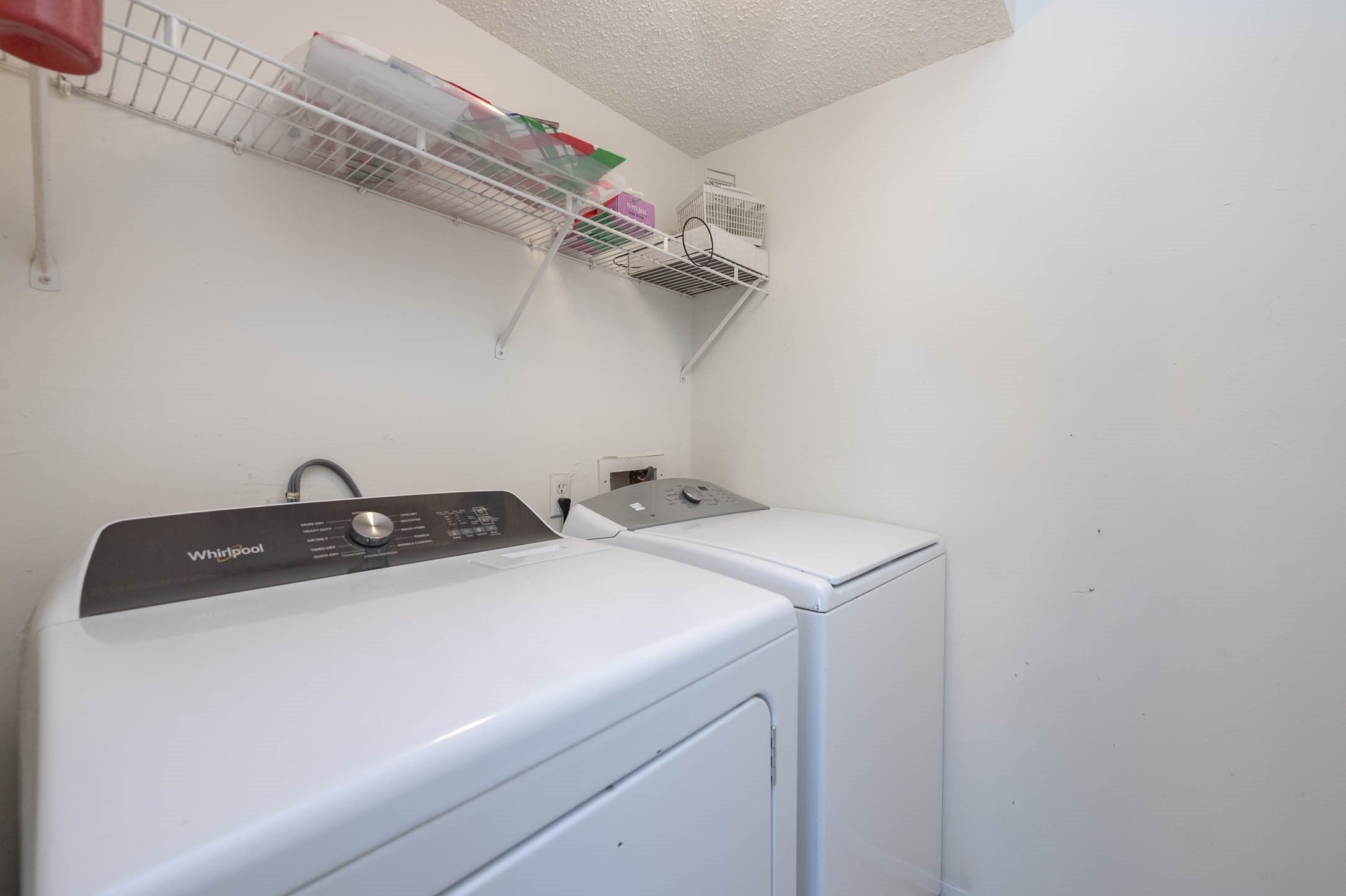 11609 Village Pl Drive Houston, TX 77077 - Photo 18 of 34 a utility room with dryer and washer