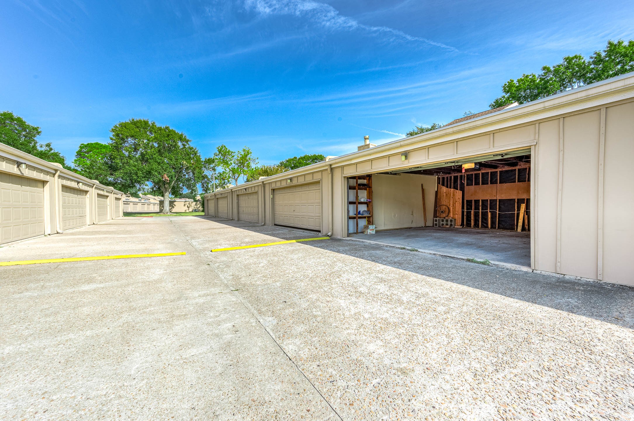 11609 Village Pl Drive Houston, TX 77077 - Photo 28 of 34 a view of a house with a backyard