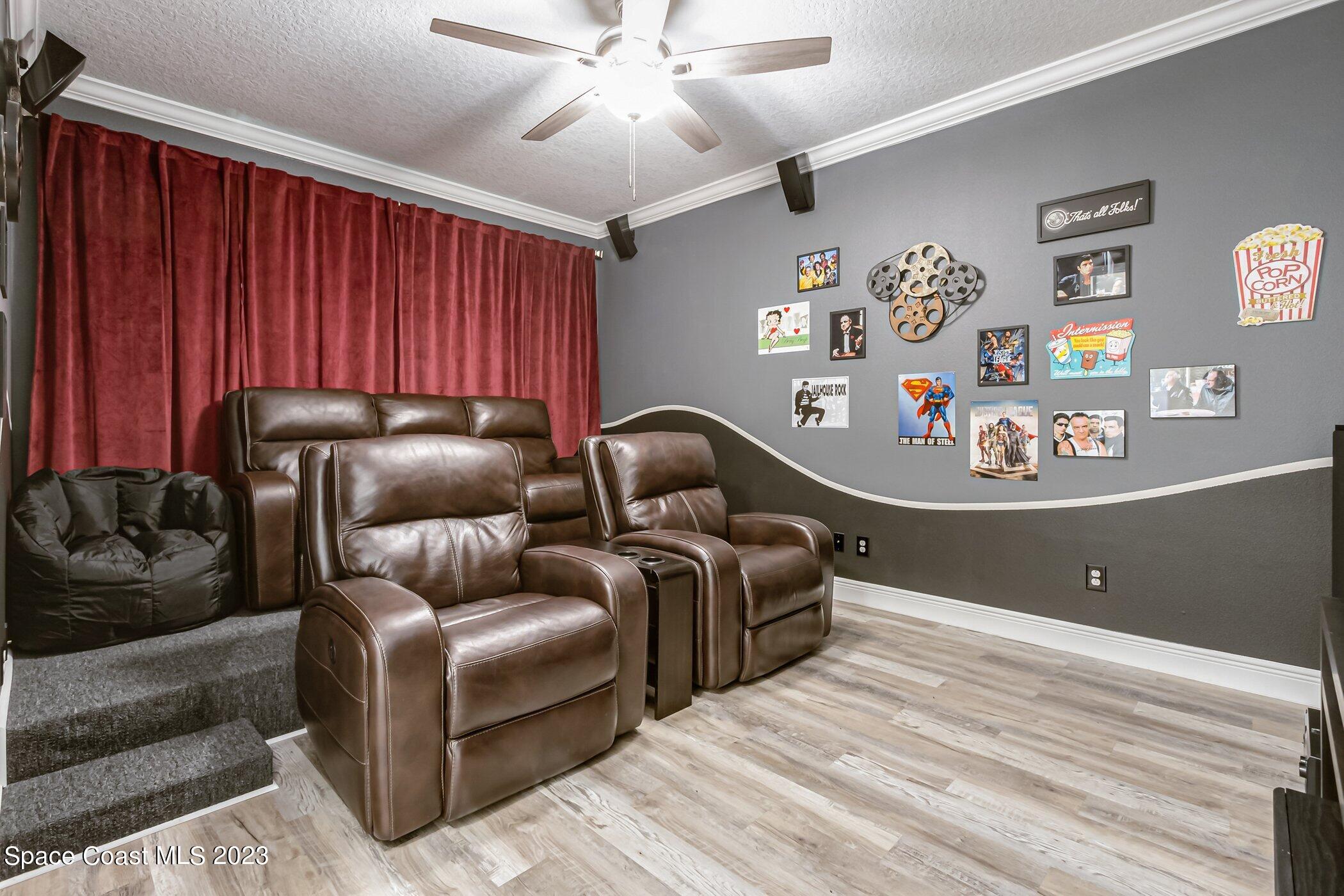 7729 Kerrington Drive Melbourne, FL 32940 - Photo 39 of 61 a living room with furniture and a window