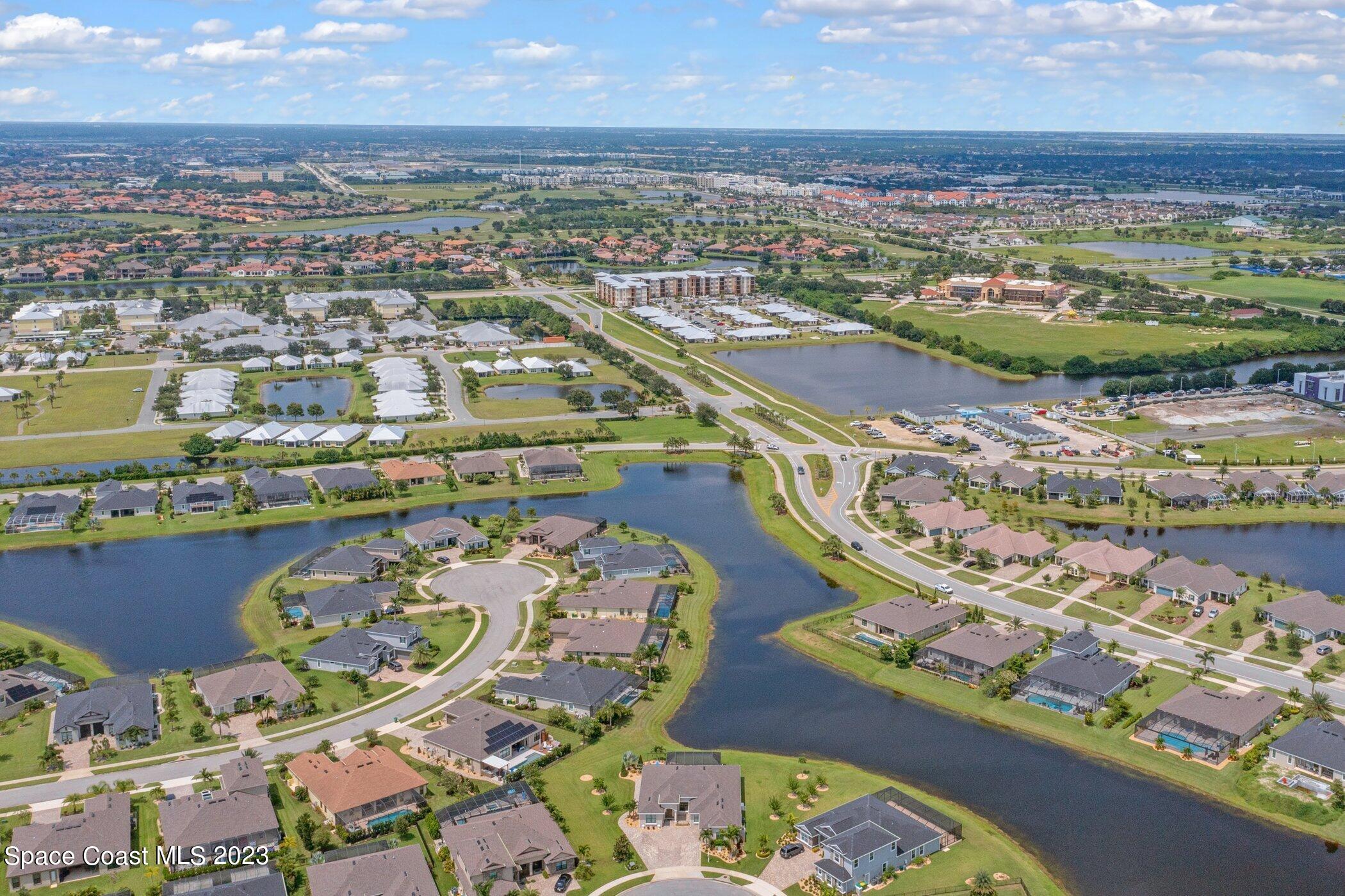 7729 Kerrington Drive Melbourne, FL 32940 - Photo 44 of 61 an aerial view of a city