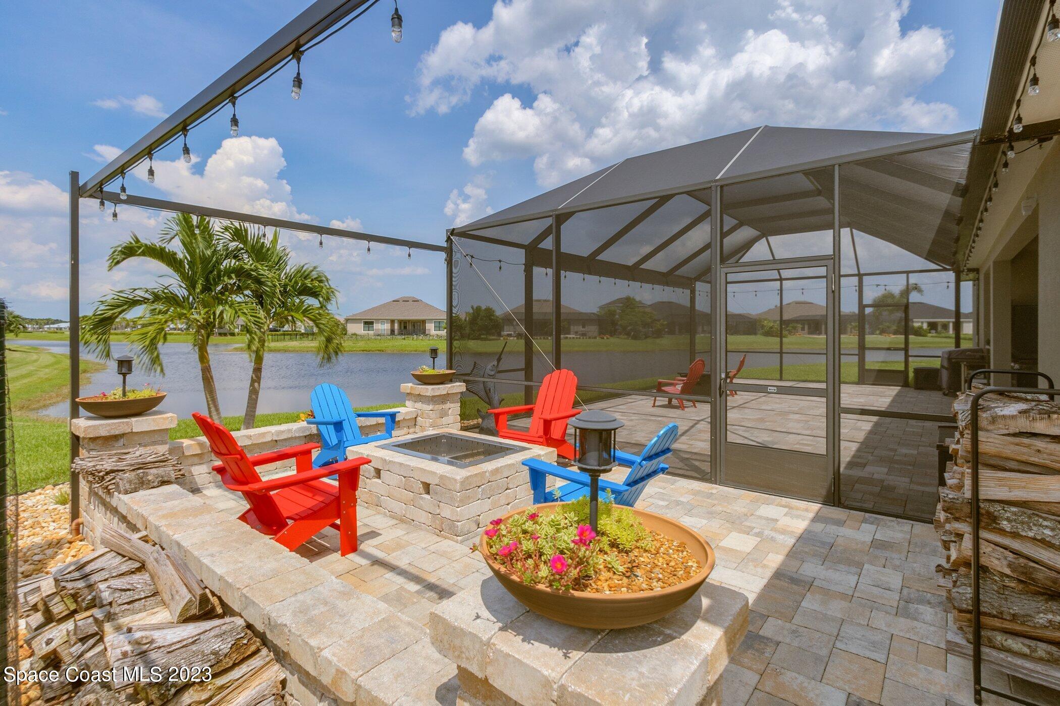 7729 Kerrington Drive Melbourne, FL 32940 - Photo 7 of 61 a outdoor view with a sitting space