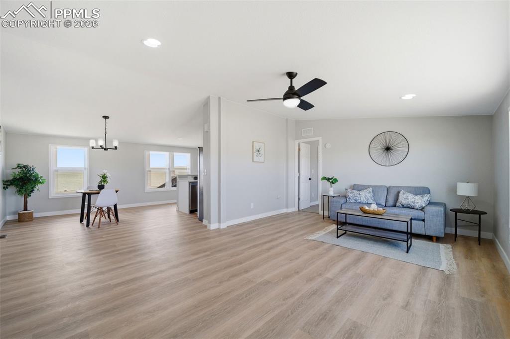 35125 Book Road Yoder, CO 80864 - Photo 5 of 45 a living room with furniture and a wooden floor