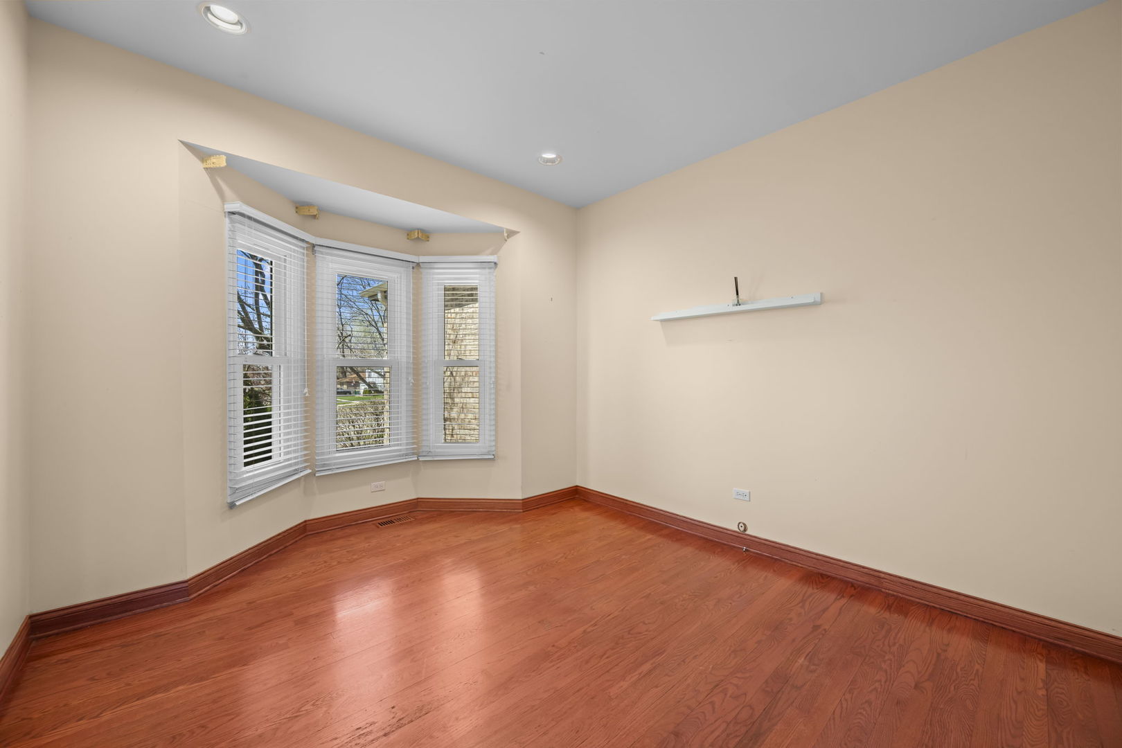 155 Lilac Lane Wheeling, IL 60090 - Photo 11 of 52 a view of an empty room with a window