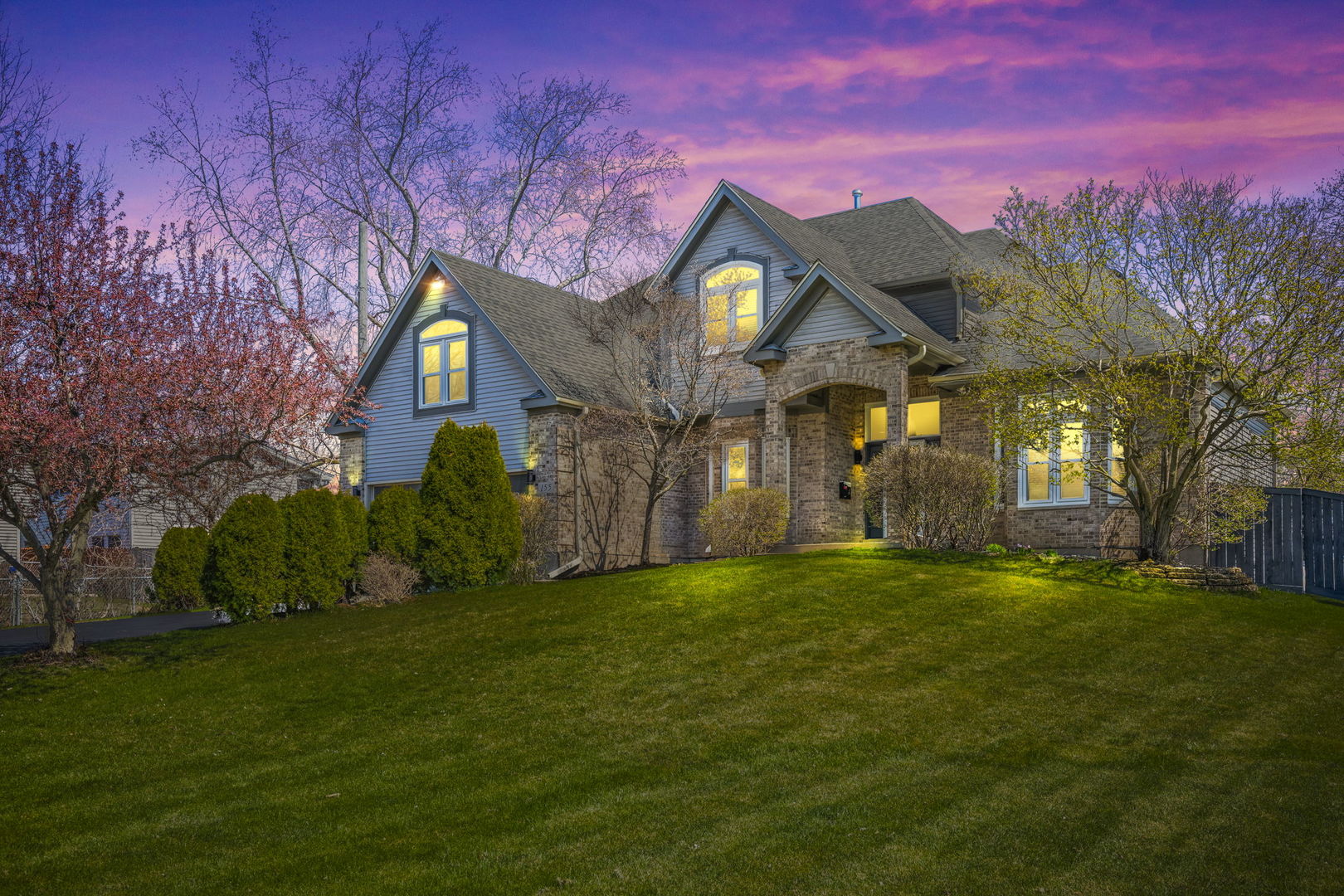 155 Lilac Lane Wheeling, IL 60090 - Photo 2 of 52 a view of a house with a big yard