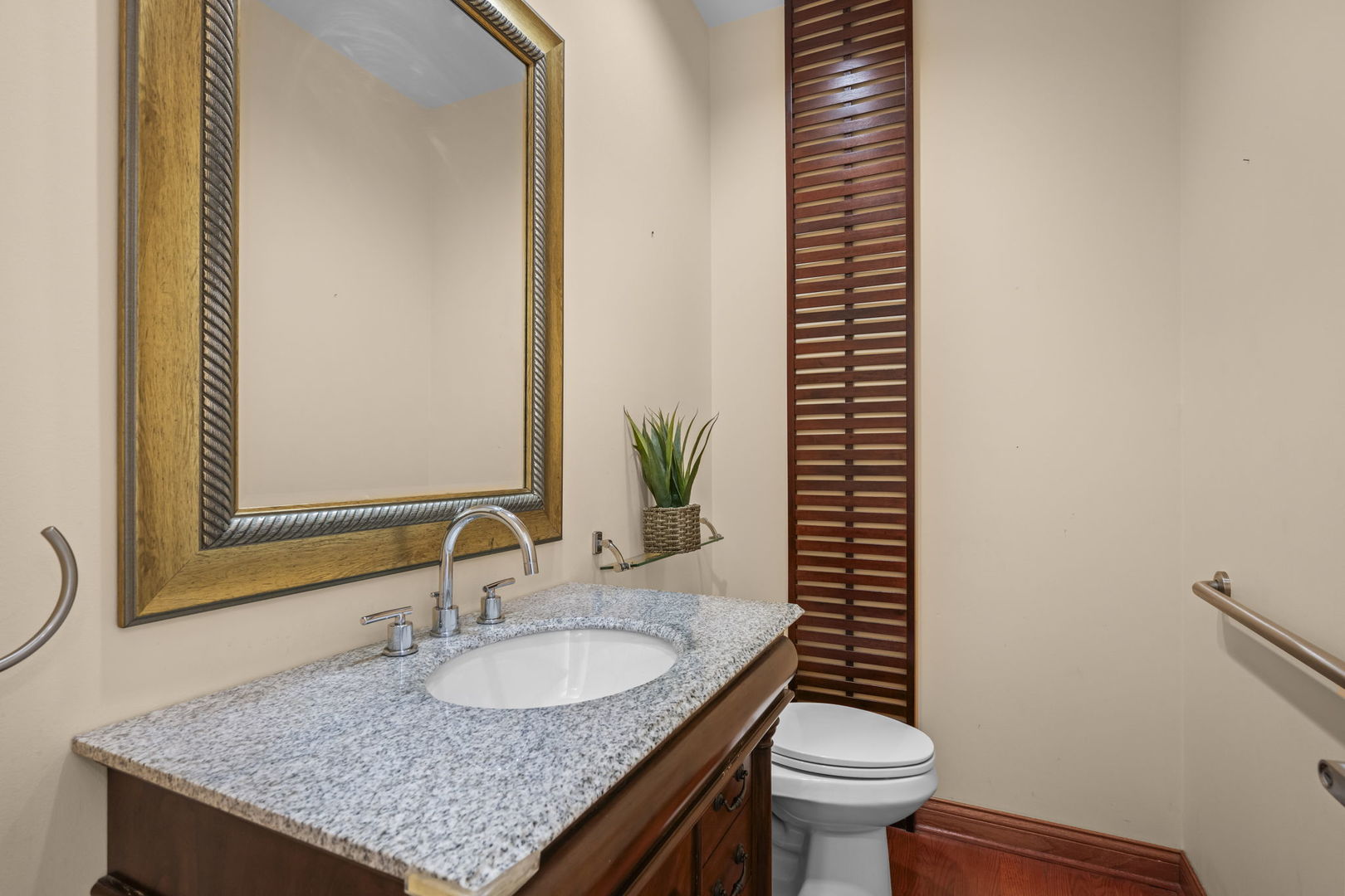 155 Lilac Lane Wheeling, IL 60090 - Photo 22 of 52 a bathroom with a granite countertop sink and a mirror