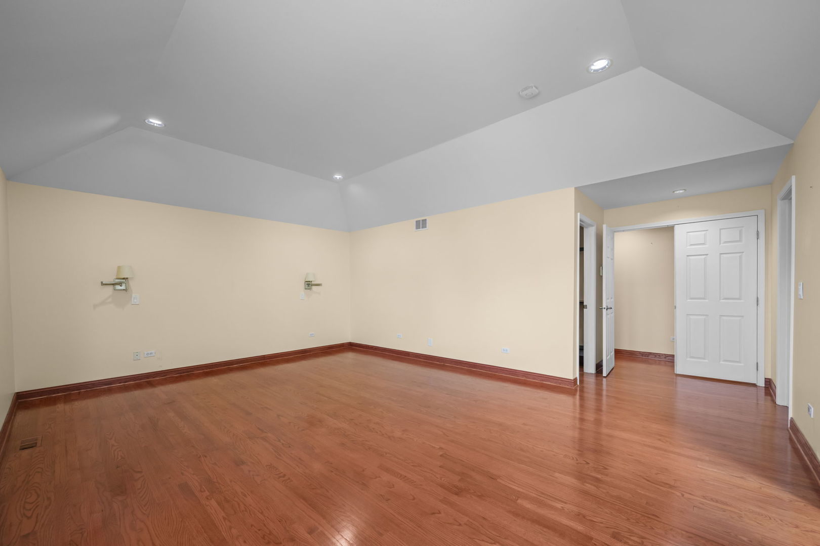 155 Lilac Lane Wheeling, IL 60090 - Photo 33 of 52 a view of an empty room with wooden floor