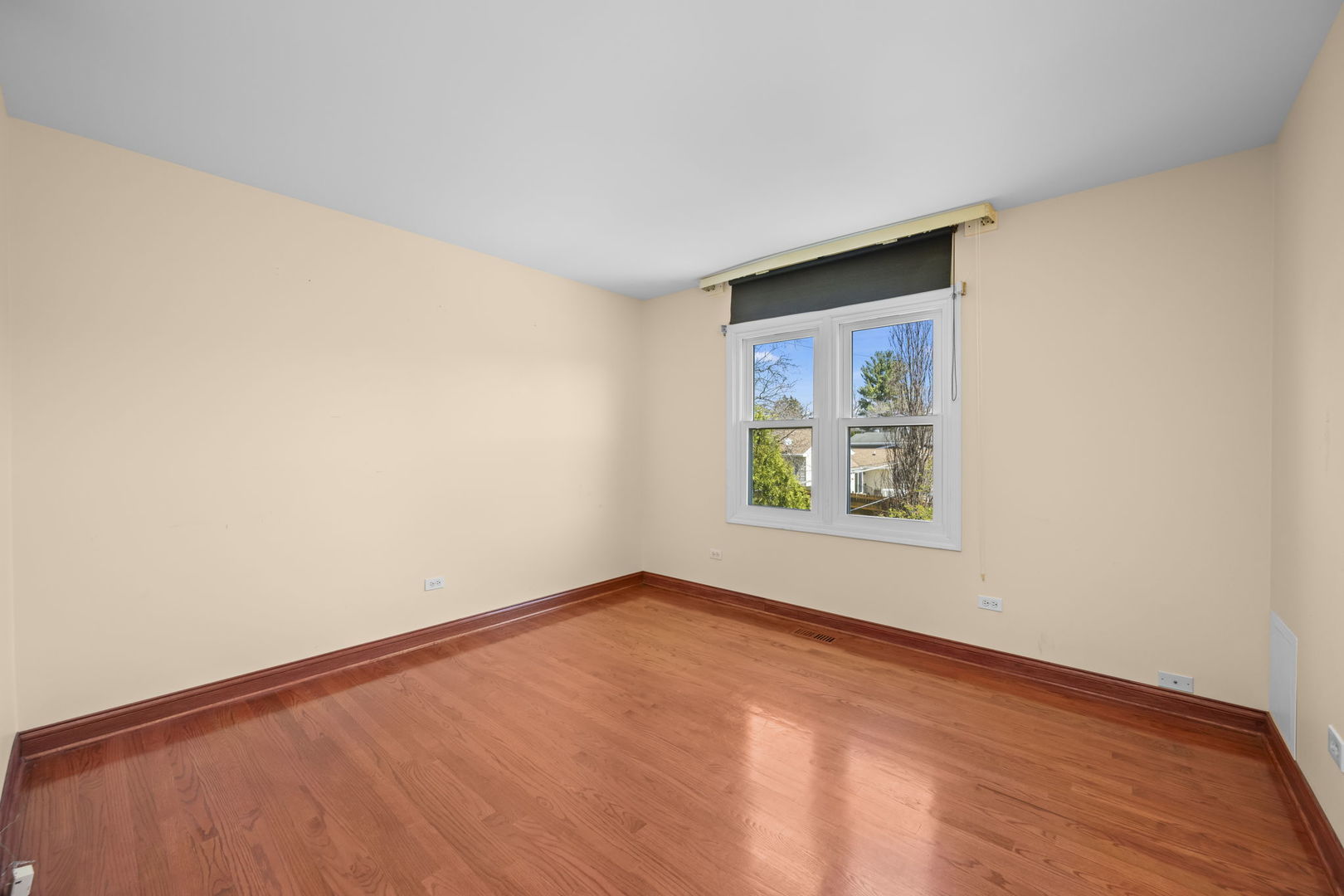 155 Lilac Lane Wheeling, IL 60090 - Photo 40 of 52 a view of an empty room with a window