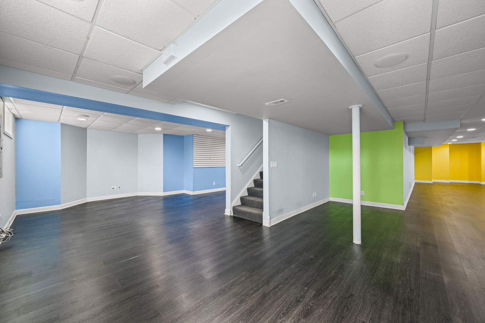 155 Lilac Lane Wheeling, IL 60090 - Photo 44 of 52 a view of an empty room with wooden floor and a window