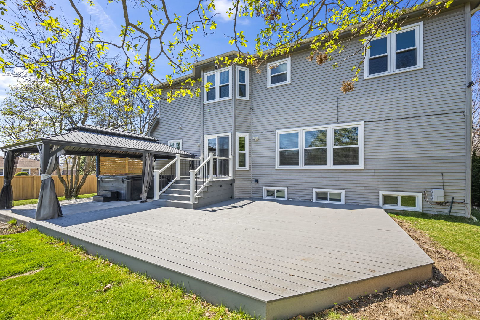 155 Lilac Lane Wheeling, IL 60090 - Photo 51 of 52 a view of a house with swimming pool and sitting area