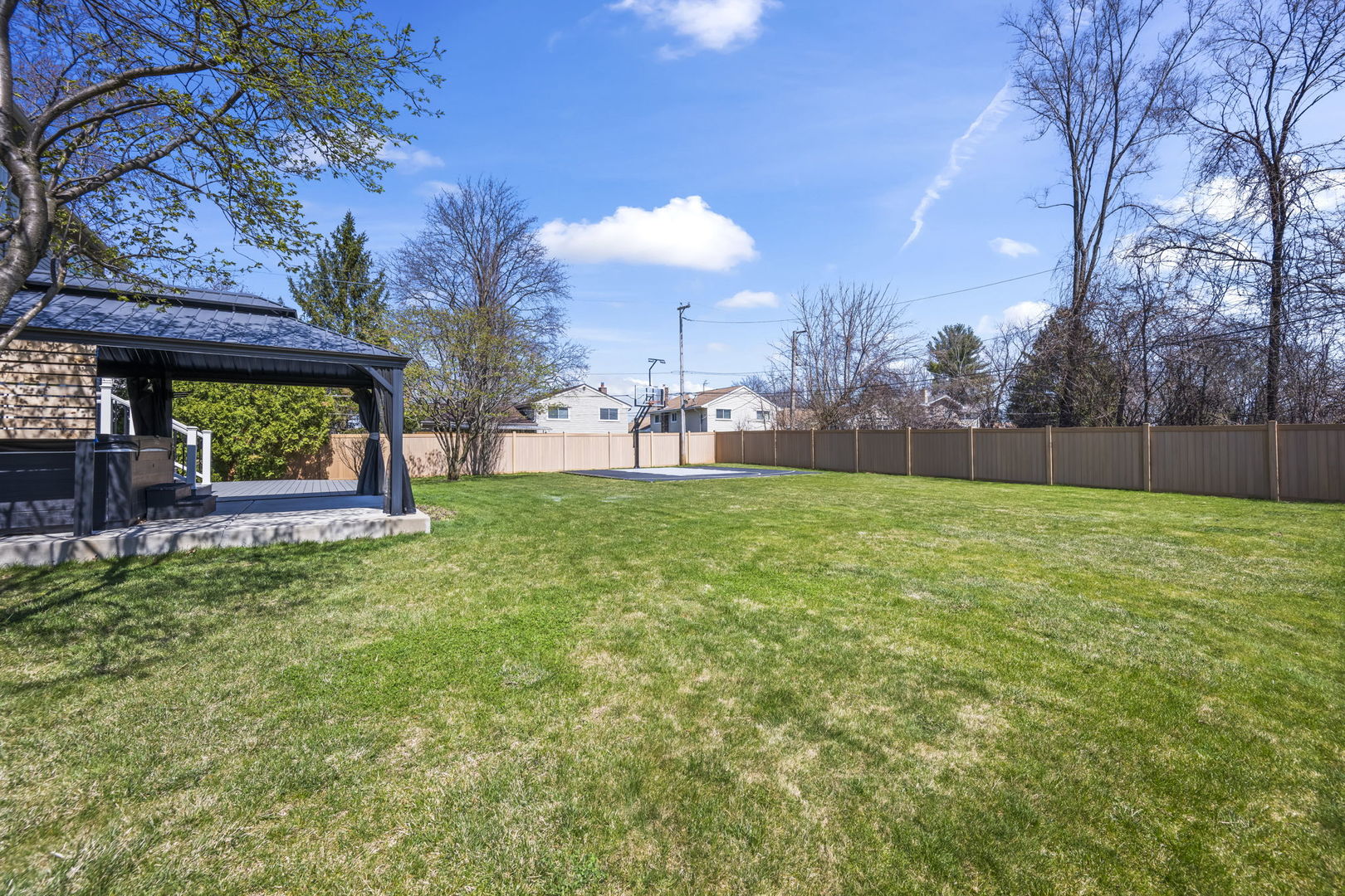 155 Lilac Lane Wheeling, IL 60090 - Photo 52 of 52 a view of a house with a yard and a garden