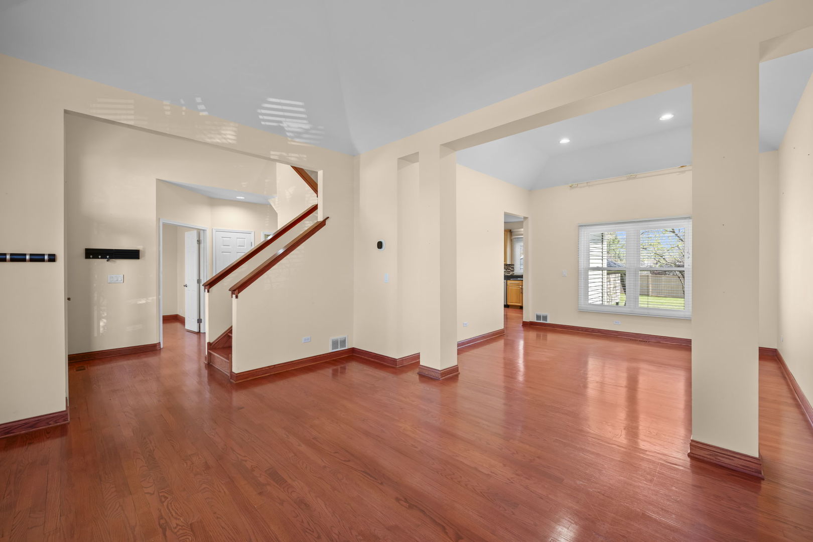 155 Lilac Lane Wheeling, IL 60090 - Photo 7 of 52 a view of empty room with wooden floor and window