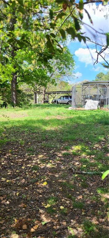 1644 Kersey Valley Road Archdale, NC 27263 - Photo 16 of 24 Behind mobile home
