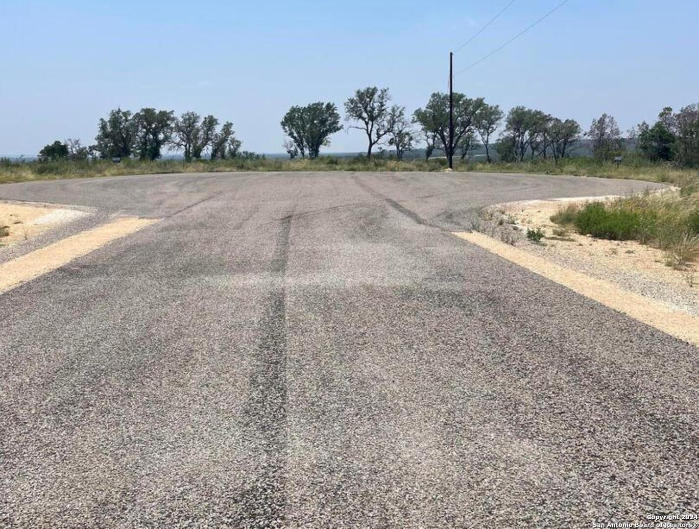 Lot 200 Valley Oaks Ranch Hondo, TX 78861 - Photo 2 of 7 a view of a lake
