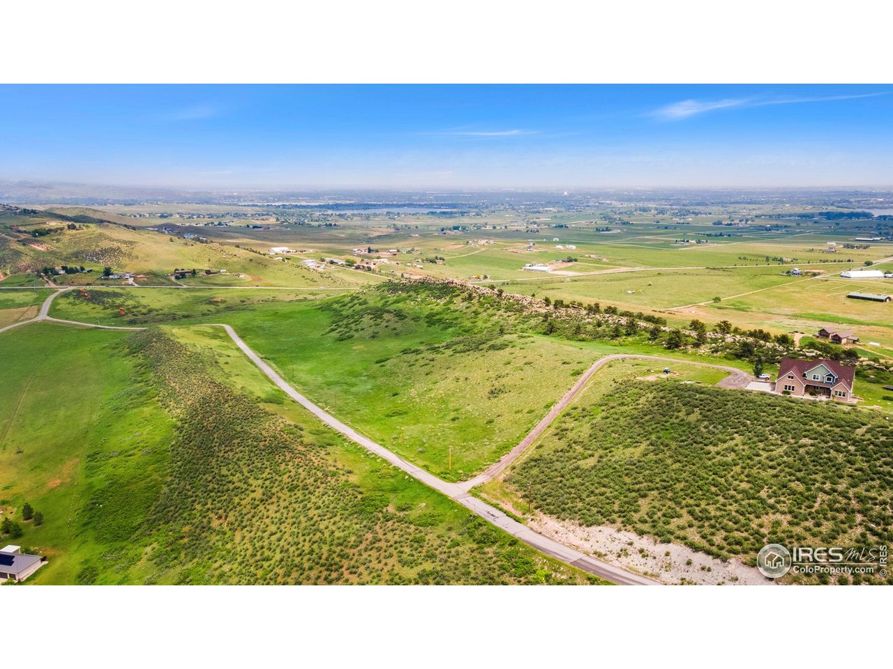 5644 Kiva Ridge Drive Berthoud, CO 80513 - Photo 7 of 11 a view of an ocean and beach