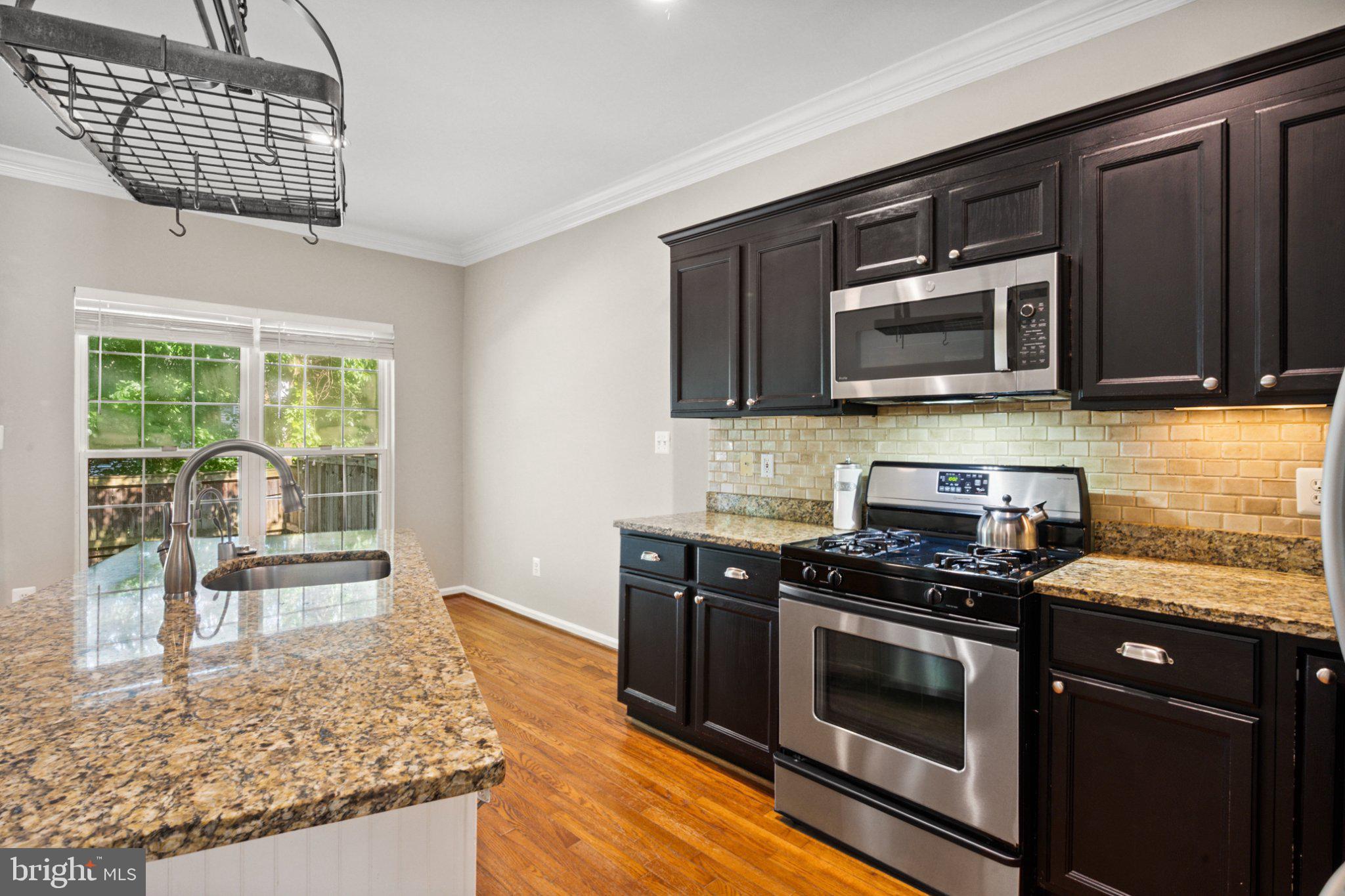 1319 Vintage Place Reston, VA 20194 - Photo 4 of 37 Modern kitchen with elegant finishes.
