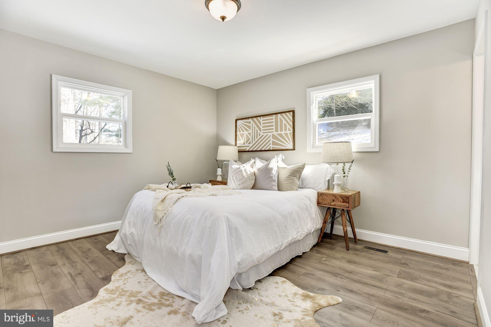 1903 Carrs Mill Road Fallston, MD 21047 - Photo 10 of 31 a bed room with a bed and a night stand