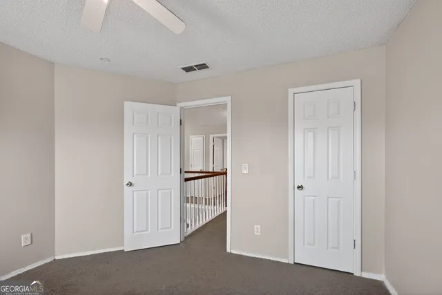 a view of a livingroom with an empty room