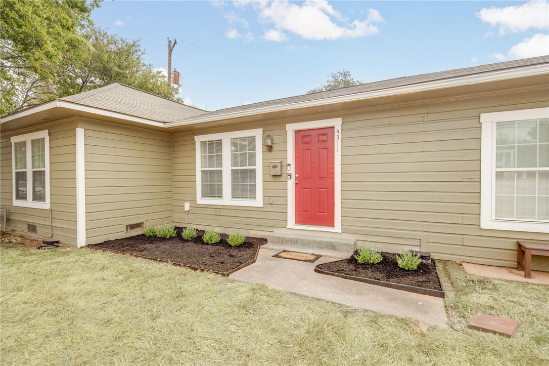 4311 Old College Road Bryan, TX 77801 - Photo 3 of 21 a front view of a house