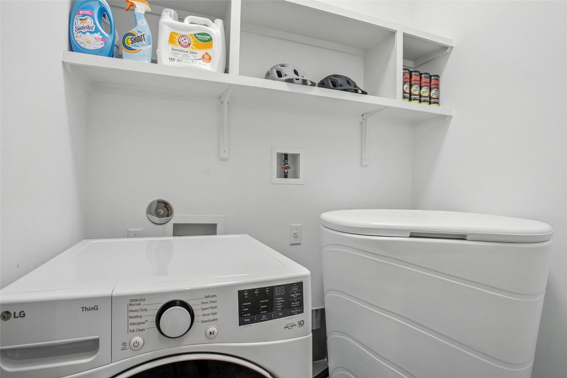 5402 Woodrow Avenue, Unit B Austin, TX 78756 - Photo 17 of 36 a utility room with dryer and washer