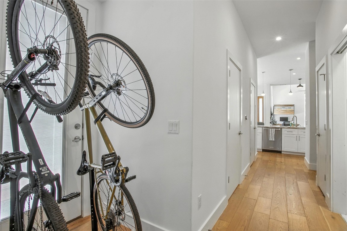 5402 Woodrow Avenue, Unit B Austin, TX 78756 - Photo 18 of 36 a view of a hallway with wooden floor