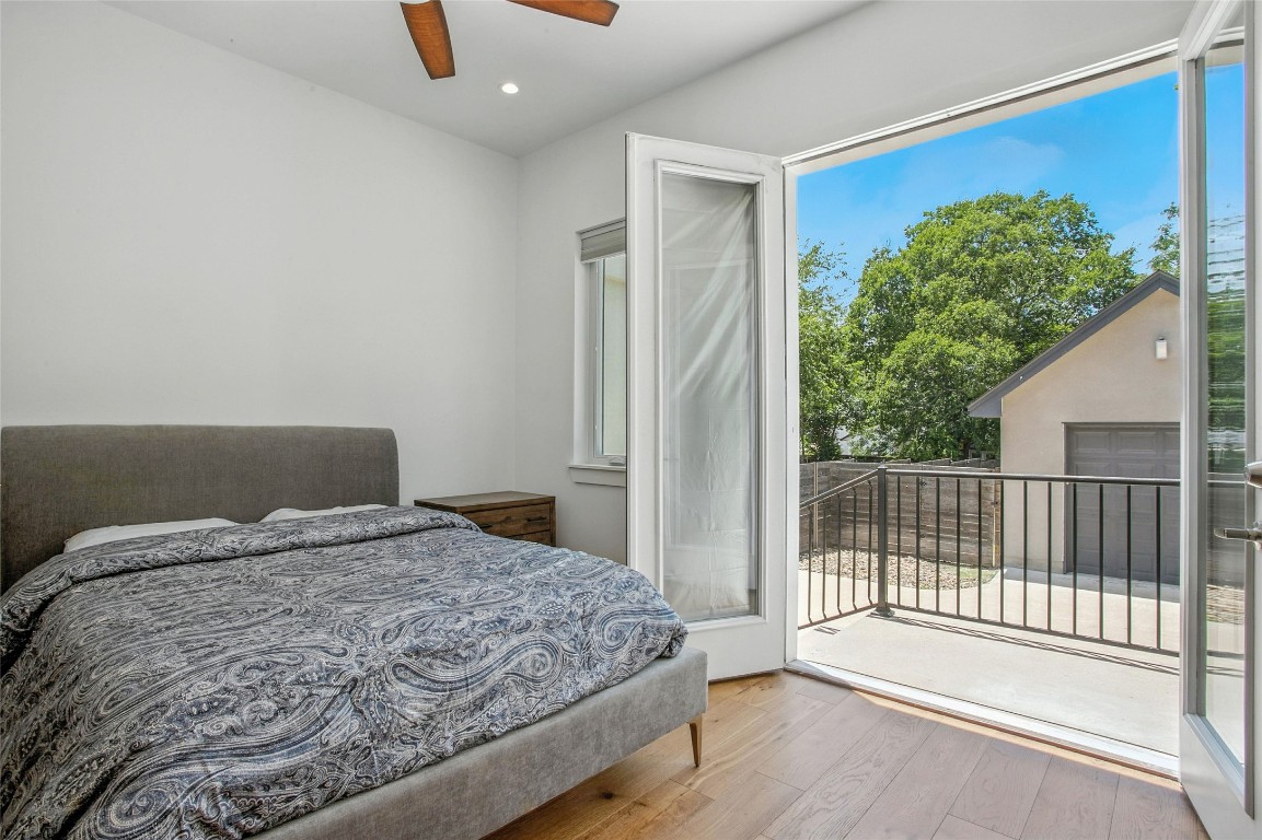 5402 Woodrow Avenue, Unit B Austin, TX 78756 - Photo 22 of 36 a bedroom with a bed and a window
