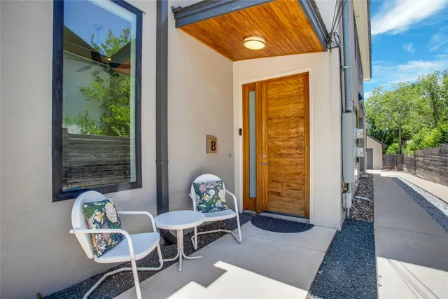 a front view of a house with patio