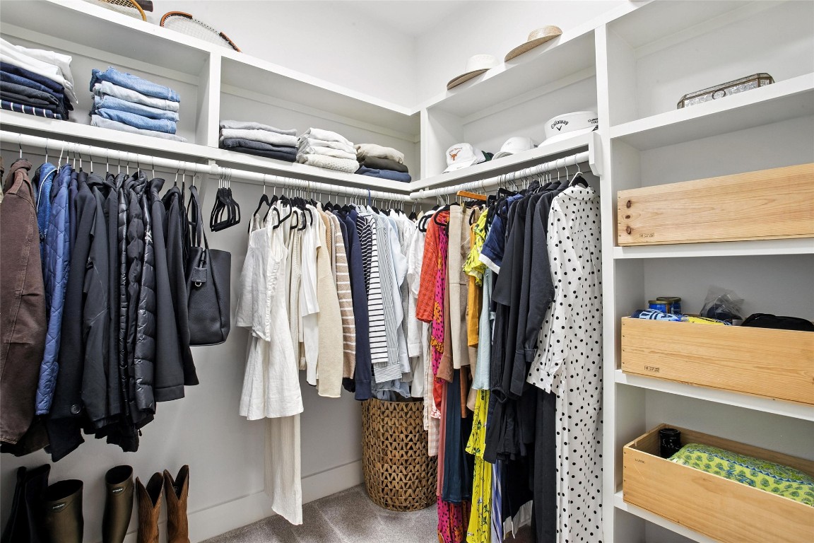 5402 Woodrow Avenue, Unit B Austin, TX 78756 - Photo 30 of 36 a view of walk in closet with clothes and shoes