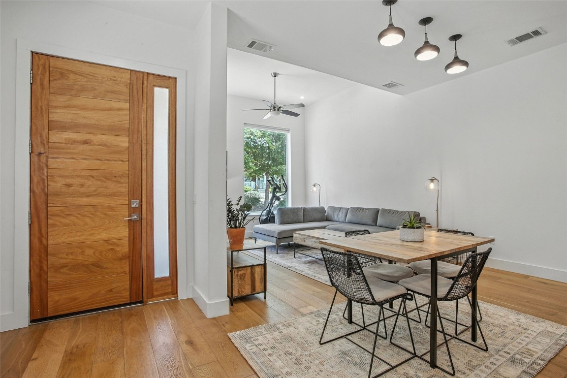 5402 Woodrow Avenue, Unit B Austin, TX 78756 - Photo 4 of 36 a view of a dining room with furniture window and wooden floor