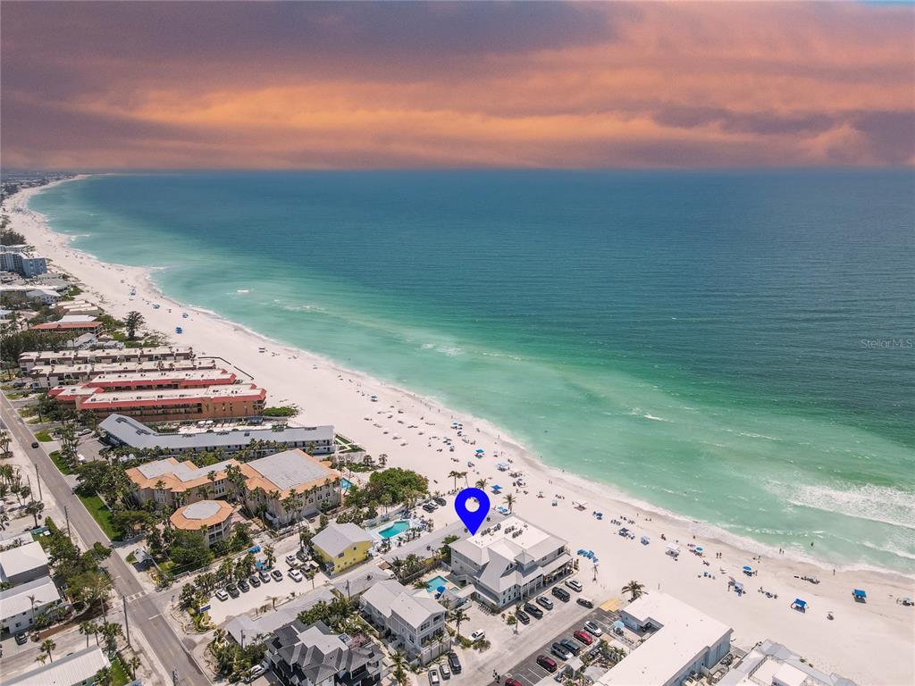 101 66th Street, Unit 6 Holmes Beach, FL 34217 - Photo 11 of 48 a view of a road with an ocean view