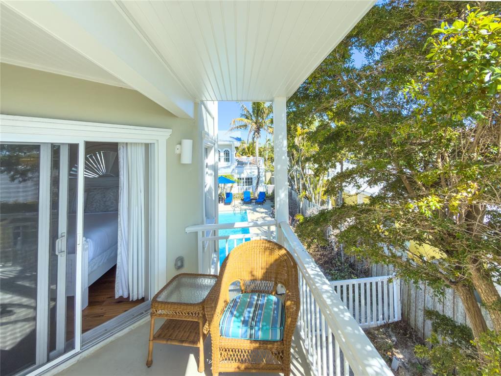 101 66th Street, Unit 6 Holmes Beach, FL 34217 - Photo 35 of 48 a view of a staircase