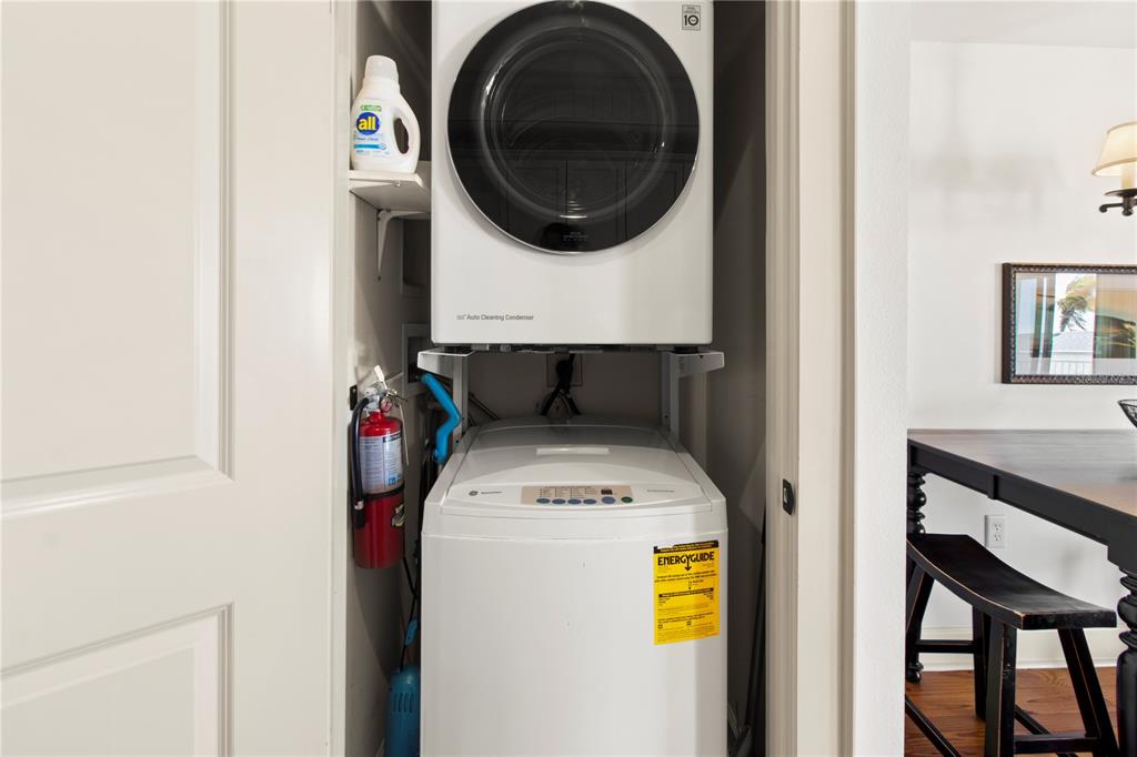 101 66th Street, Unit 6 Holmes Beach, FL 34217 - Photo 42 of 48 a utility room with dryer and washer