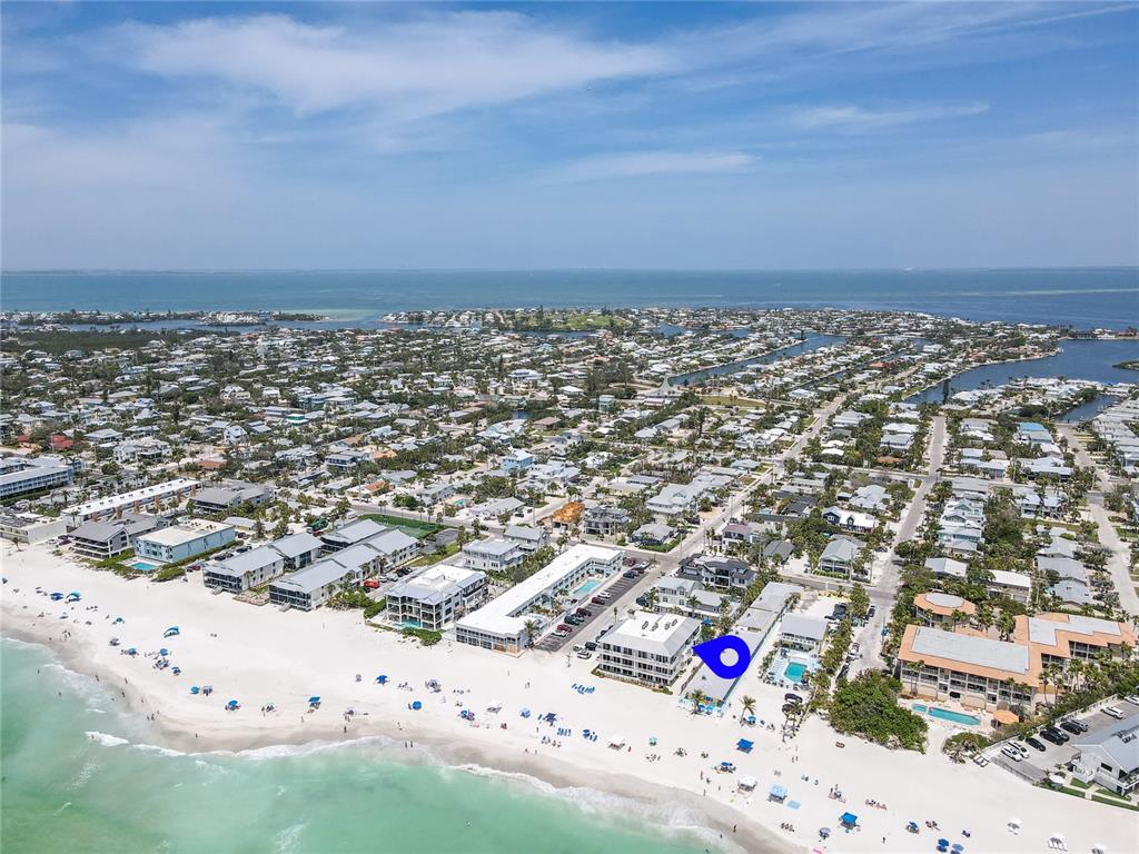 101 66th Street, Unit 6 Holmes Beach, FL 34217 - Photo 7 of 48 an aerial view of beach and city