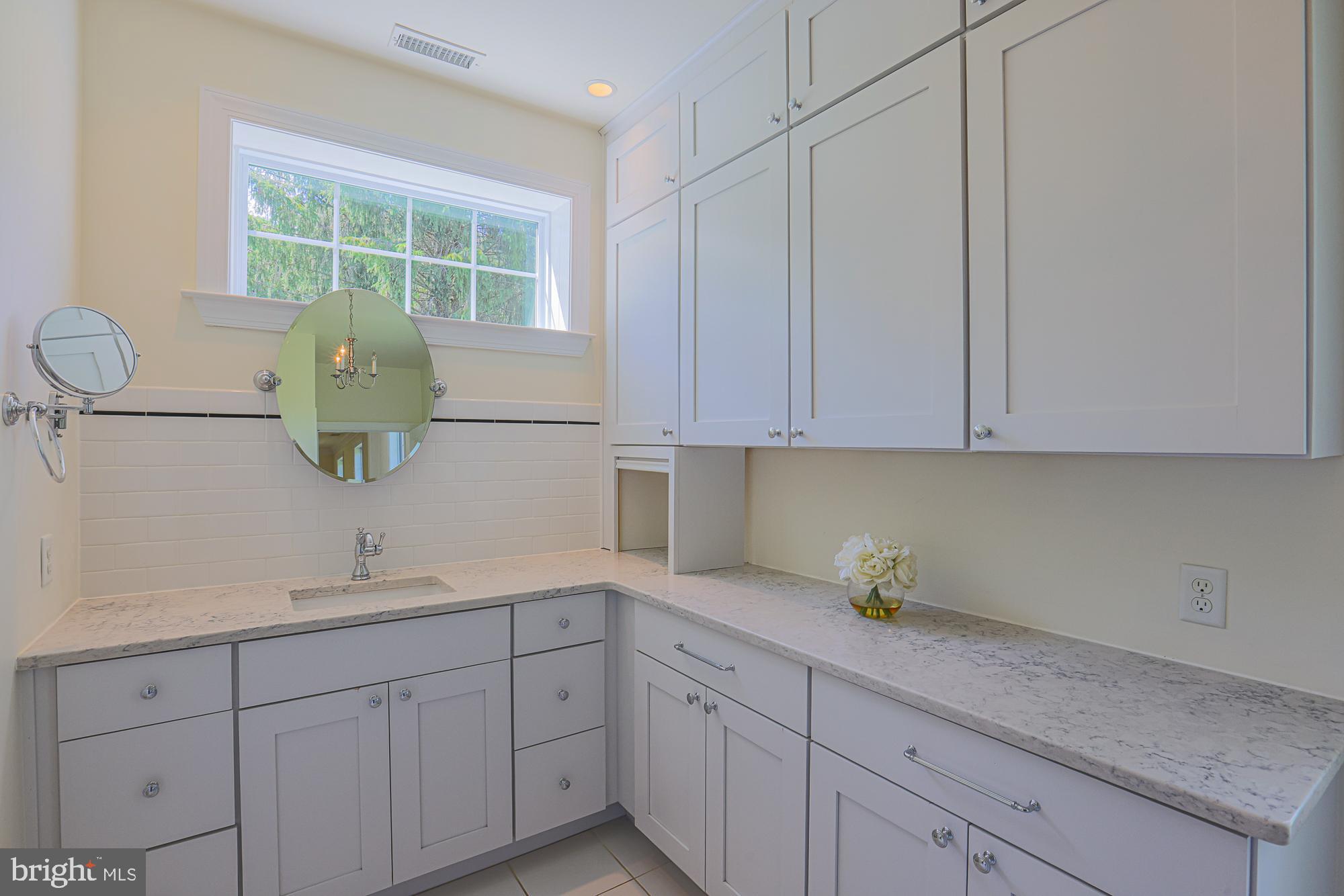 19020 Gunpowder Road Hampstead, MD 21074 - Photo 69 of 109 Dressing room and primary bath suite 1