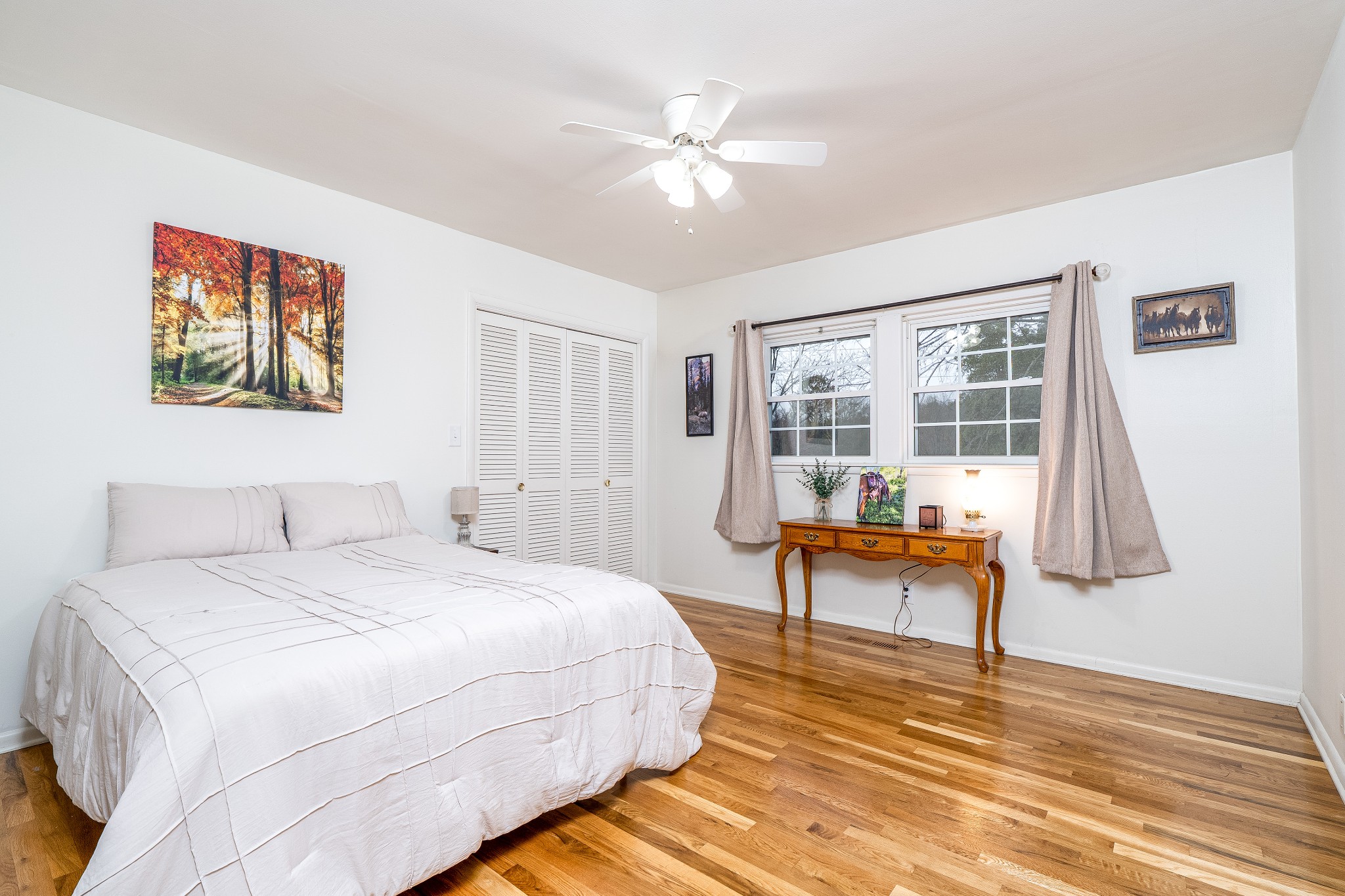 545 Puryears Bend Road Hartsville, TN 37074 - Photo 18 of 46 a bedroom with a bed and a table