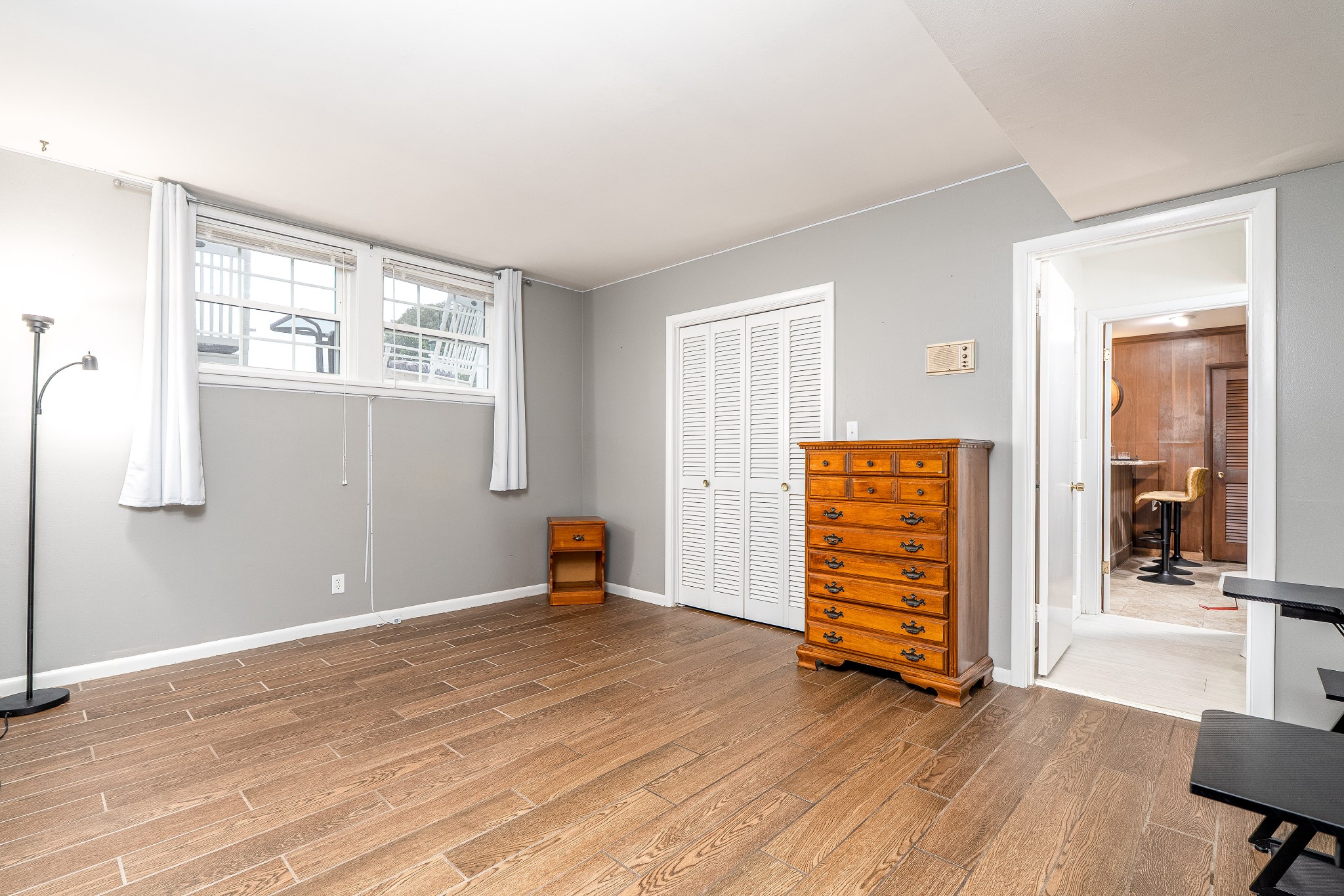 545 Puryears Bend Road Hartsville, TN 37074 - Photo 24 of 46 an empty room with wooden floor and windows