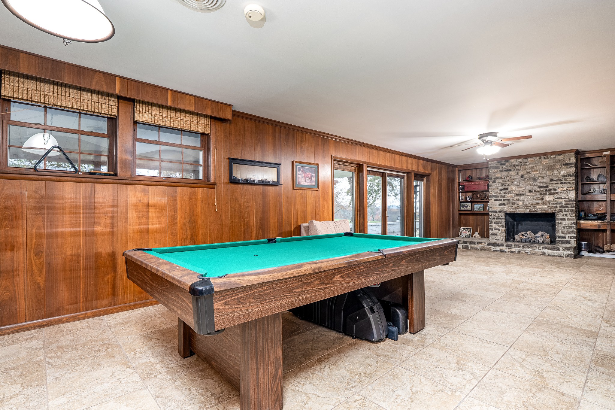 545 Puryears Bend Road Hartsville, TN 37074 - Photo 29 of 46 a room with pool table and windows