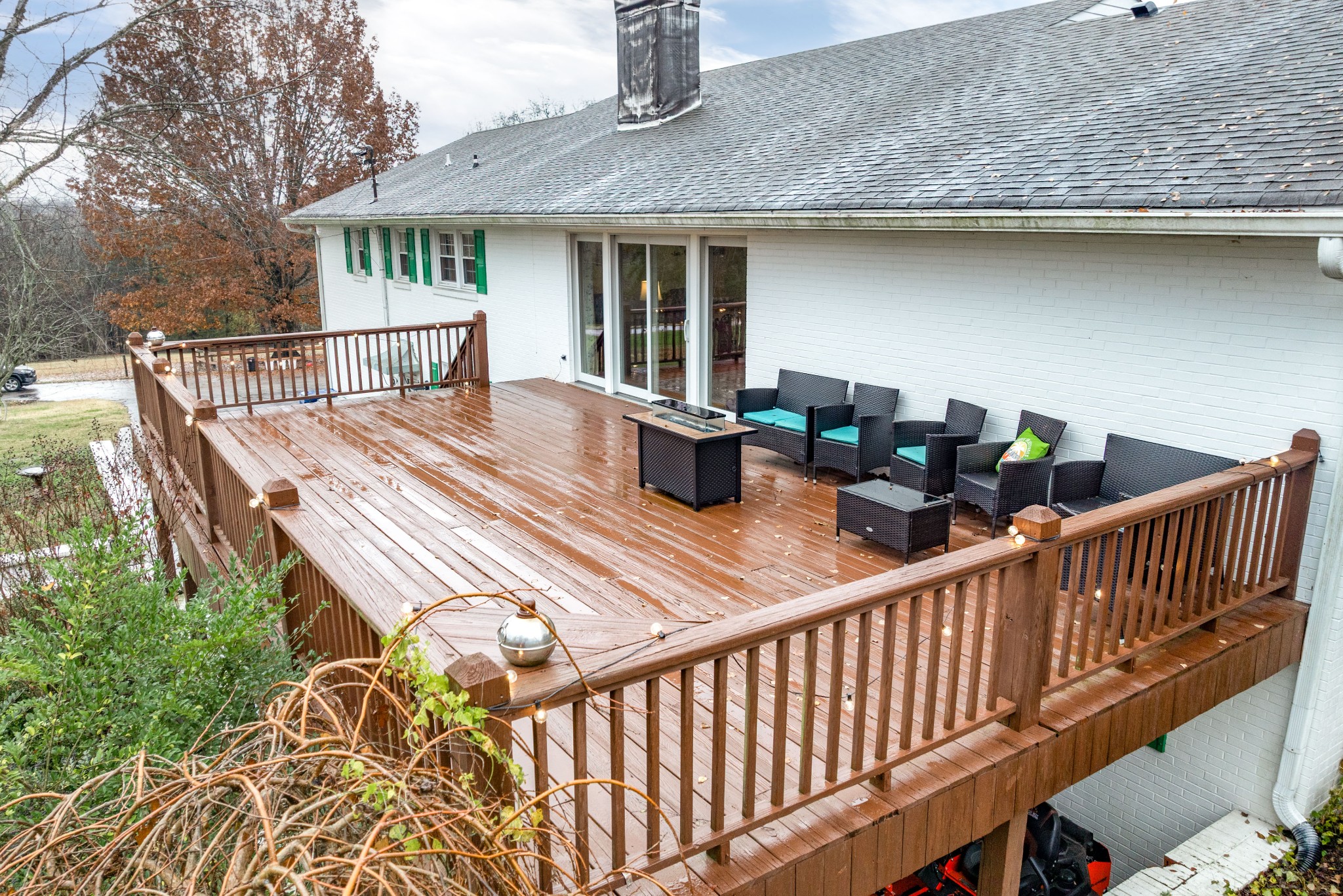 545 Puryears Bend Road Hartsville, TN 37074 - Photo 37 of 46 a view of a deck with chairs and wooden floor